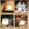 A collage of four images showing a white LED table lamp in different settings: nursing, ambient, camping, and bedside. Voir les images du produit
