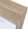 A close-up view of the corner of a sideboard, showing the wood grain texture on the top and side, and a white drawer front with a handle. Produktbild-Vorschau