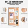 A cork bulletin board with a silver aluminum frame and a clear acrylic door, showcasing various documents and charts pinned to the board. Callout circles highlight specific features like hinges, frame, PET cover, and lock. Podgląd zdjęcia produktu