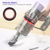 A hand holds a vacuum cleaner, demonstrating its use with a dustbin seal. A separate seal is shown in the foreground. Voir les images du produit