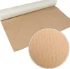 A roll of beige faux leather fabric is shown, with a close-up inset of the texture. Náhled obrázku produktu