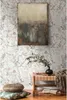 A living room scene with floral wallpaper, a painting, a bench with a vase and plant, and pillows on the floor. Produktbild-Vorschau