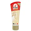 A tube of shoe cream with a red cap and a beige body, showing a graphic of shoe laces. Náhled obrázku produktu