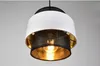 A close-up studio shot of a multi-tiered pendant light fixture. Podgląd zdjęcia produktu