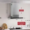 A kitchen scene showing a range hood with dimensions and installation guidelines. Produktbild-Vorschau