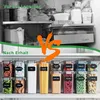 A split image showing a disorganized refrigerator shelf before storage and an organized shelf with clear storage containers after storage. Produktbild-Vorschau