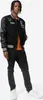 A young man wearing a varsity jacket and jeans. Produktbild-Vorschau