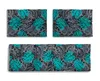 Three cushions with a tropical leaf pattern are arranged on a white background. Produktbild-Vorschau