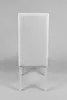 The back view of a white upholstered dining chair with white wooden legs, set against a light gray background. Voir les images du produit
