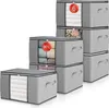 A stack of grey fabric storage boxes with clear fronts, some filled with folded items. Voir les images du produit