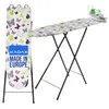 An ironing board with a butterfly pattern and an iron on top, shown in a studio setting. Produktbild-Vorschau