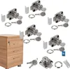 A collage of several cabinet locks with keys and a small wooden cabinet with drawers. Náhľad obrázku produktu