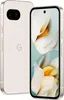 A white Google Pixel 9a smartphone is shown from the back and side, with its screen displaying a floral image. Produktbild-Vorschau