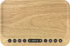 A top-down view of a wooden-effect alarm clock with buttons on the front. Anteprima dell’immagine prodotto