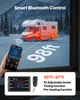 A hand holding a smartphone with a heating app open, connected via Bluetooth to a diesel heater in an RV parked in a snowy landscape. Voir les images du produit
