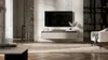 A modern living room with a wall-mounted TV and media console. Produktbild-Vorschau
