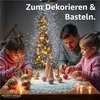 A family decorating a Christmas tree with artificial snow and ornaments. Náhled obrázku produktu