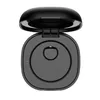 A top-down view of an open black charging case for a smart ring. Voir les images du produit