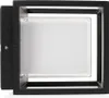 A close-up, front-facing studio shot of a black, square outdoor wall light with a frosted white glass diffuser. Produktbild-Vorschau
