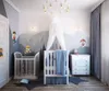 A nursery room with two cribs, a dresser, and Paw Patrol themed wall decorations. Anteprima dell’immagine prodotto