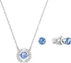 A set of jewelry, including a necklace and earrings, with blue stones. Produktbild-Vorschau