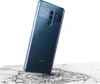 A dark blue Huawei phone is shown at an angle, resting on a cracked glass surface, against a white background. Anteprima dell’immagine prodotto