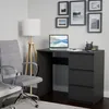 A modern office desk setup with a laptop, chair, and lamp. Náhled obrázku produktu