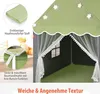 Close-up view of a green children's play tent with star-shaped lights and white decorative trim, showing details of the fabric and a mat. Náhled obrázku produktu