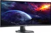 A curved computer monitor displaying a space scene. Voir les images du produit