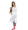 A woman in a nightgown and cap holding a teddy bear. Produktbild-Vorschau