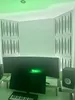 A recording studio setup with acoustic panels on the walls, monitors, and a keyboard. Podgląd zdjęcia produktu