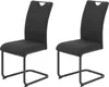 Two black dining chairs with cantilever bases are shown against a white background.