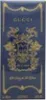 A dark blue box with gold ornate details and text. Anteprima dell’immagine prodotto