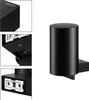 A collage of images showing a black soap dispenser from different angles, including close-ups of its mounting mechanism and a detail of the brand name. Voir les images du produit