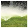 Two sprinklers watering a green lawn. Produktbild-Vorschau