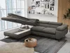A modern living room with a sectional sofa, coffee table, and large windows. Produktbild-Vorschau