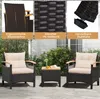 A set of outdoor furniture including two chairs and a small table, displayed on a patio with a house in the background. Voir les images du produit