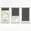 Three windows with roller blinds, showing different levels of coverage. Náhled obrázku produktu