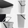 A collage of four images showing different views of a gray plastic trash can with a black lid and handle. Anteprima dell’immagine prodotto