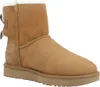 A single brown Ugg boot with a bow on the back, shown from the side against a white background. Produktbild-Vorschau