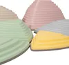 A group of colorful, tiered stepping stones for children, arranged in a circular pattern against a white background. Produktbild-Vorschau