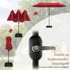 A collage of images showing a red double patio umbrella in various states (open, closed, partially open) and a close-up of its crank mechanism, set against a blurred outdoor background. Anteprima dell’immagine prodotto