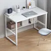 A white desk with shelves, a laptop, books, and a clock. Podgląd zdjęcia produktu