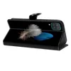 A black flip phone case with a feather and blue feather design. Produktbild-Vorschau