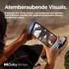 A person is holding a smartphone and watching content, with sound wave graphics emanating from the phone. Náhľad obrázku produktu
