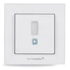 A white smart home motion detector with a blue indicator light, mounted on a white wall plate. Produktbild-Vorschau