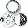 Three plates with geometric patterns are arranged on a white background. Produktbild-Vorschau