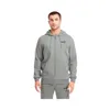 A man wearing a gray Puma hoodie and sweatpants against a white background. Produktbild-Vorschau
