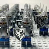A group of Lego knights with shields and swords, arranged in rows. Náhled obrázku produktu