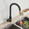 A black and gold kitchen faucet is shown in use, with water running into a sink. Produktbild-Vorschau
